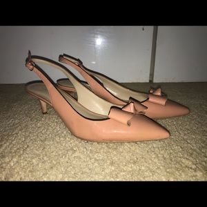 Rosy mauve colored patent kitten heels.